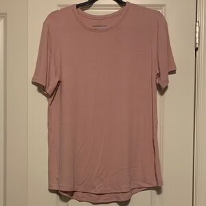 Lululemon Pink Haze Hold Tight T-Shirt, Sz 16
Good Condition, wash wear